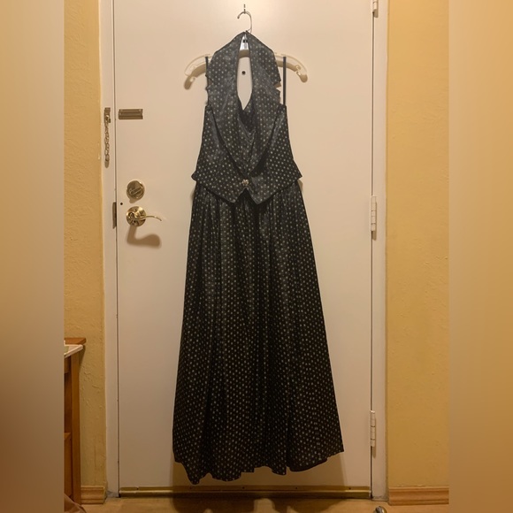 Black gown with gold and purple details. - Picture 1 of 8